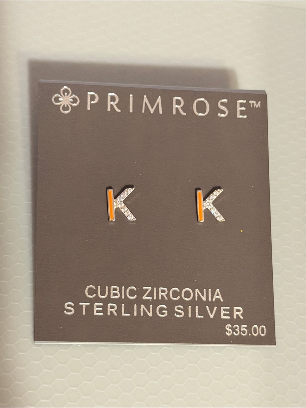 Primrose Sterling Silver 'K' Cubic Zirconia Earrings in Orange